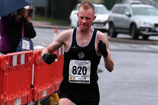 Racing to victory in the half marathon.