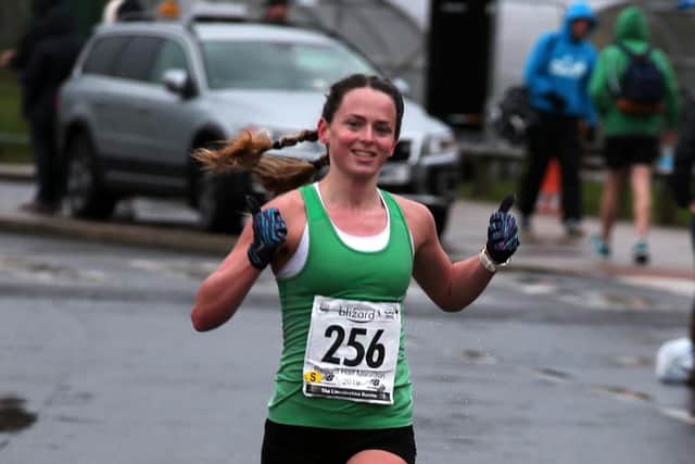 Third lady home in the half marathon.