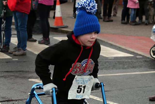 Local hero Bradley started the fun run before taking part.