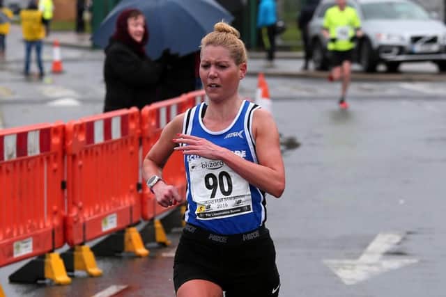 Second lady home in the half marathon.