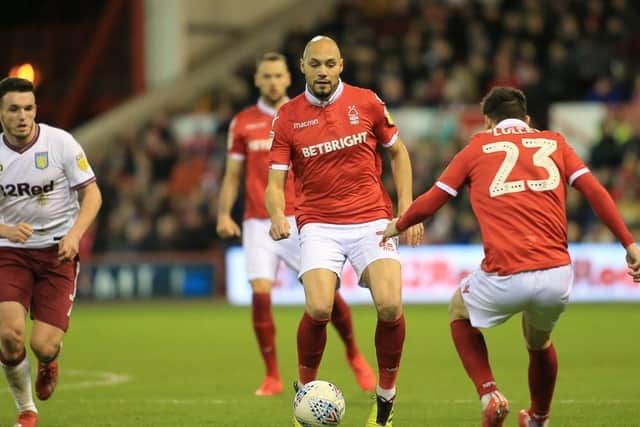 Joe Lolley looks to get on the ball