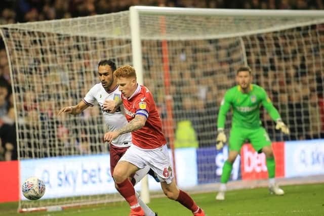 Jack Colback battles for the ball