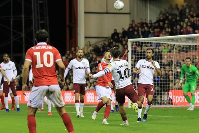 The ball bounces around Villa's penalty box as Forest look to reduce the arrears