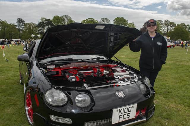 Amanda Gray pictured with her modified car