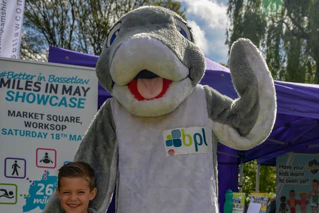 Jesse Hazard, four, is pictured with Derek the Dolphin from Retford Leisure Centre
