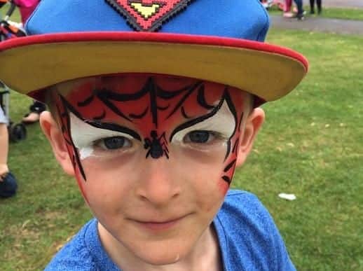 One boy had his face painted like Spiderman