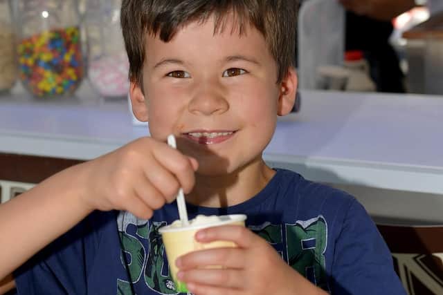 Enjoying his ice cream is Luca Banks, seven