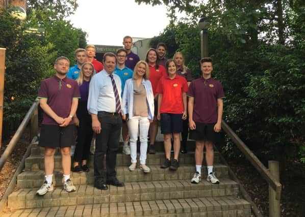 Secretary of State, Esther McVey, with employees at Center Parcs