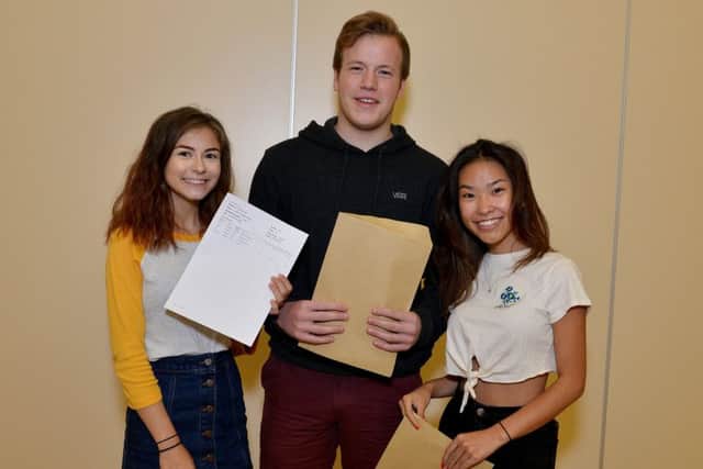 Students collect their AS level results from Outwood Academy Post 16 Centre, pictured are Katie Hanson, Joseph Walus and Jasmine Dean