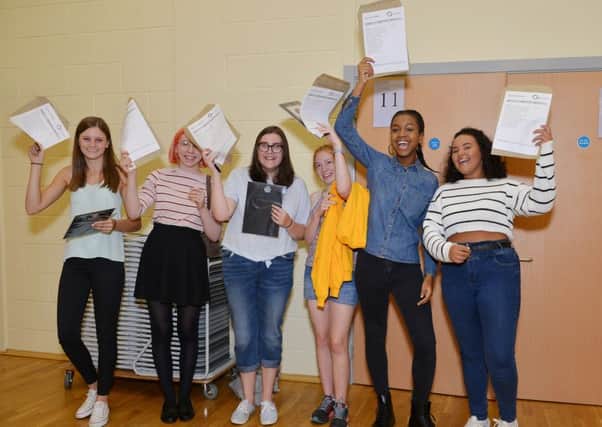 Students collect their GCSE results at Outwood Academy Valley, picture includes Ellie Caudwell, Dannielle Ellis, Elyse Elcin, Georgia Fir\elds, Aneilia Simpson
