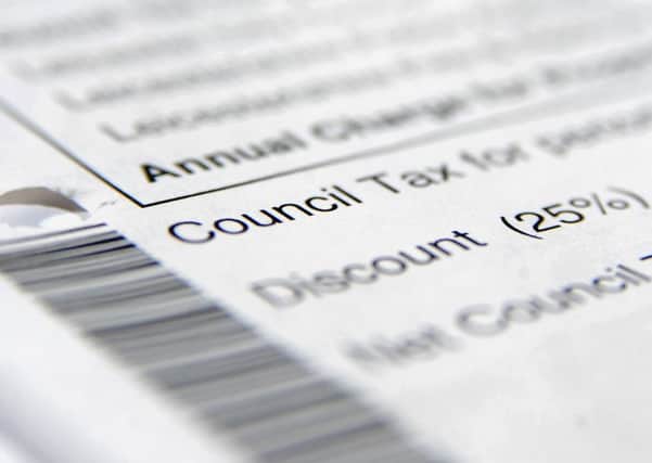 Less people are claiming council tax benefit. Photo: PA/Joe Giddens