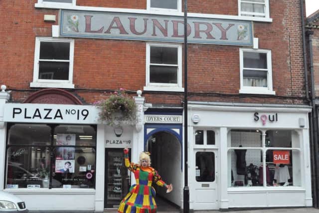 Widow Twankey, alias Steven Hall, out and about in Retford town centre.