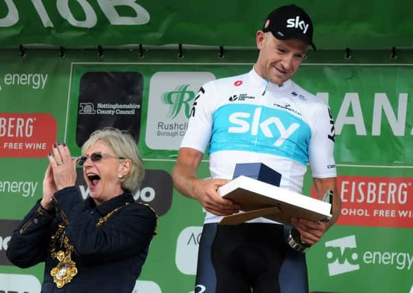 Tour of Britain.
Winner Ian Stannard takes to the podium to receive his awards from Mansfield Mayor Kate Allsop.
