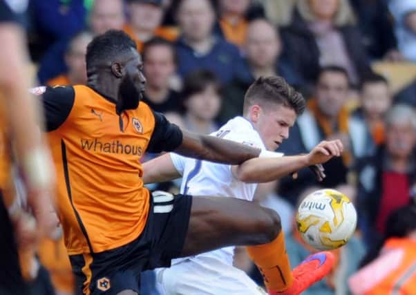Bakary Sako and Sam Byram, pictured here playing for Wolves and Leeds, could be set to team up at Forest