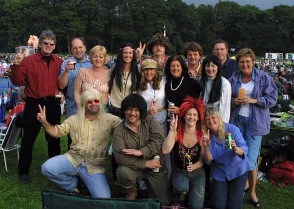 2002: A fabulous bygone shot from the 60s concert at Clumber Park. Do you recognise anyone you know on this group shot?