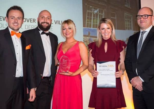Pictured are Paul Williams of Mitsubishi Electric, who sponsored the award and Mark Maisey, Sue Hunter, Jenna Frudd and Craig Pygall of Woodheads.