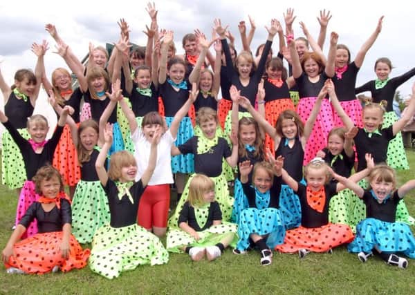 2003: These girls look brilliant in their outfits and are having lots of fun at Whitwell Carnival. Did you go? Picture courtesy of Jon Knight.