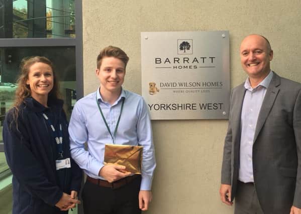 Gabriel Lynch (centre) with Sula Sneddon, his mentor from the Construction Industry Training Board, and Martin Purdy, of Barratt Homes.