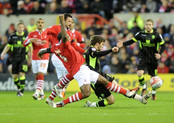Wes Morgan in action for Forest - a successful product of non-League football