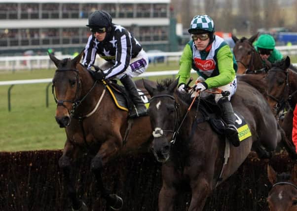 The mighty Denman (right), who won the Hennessy Gold Cup twice.