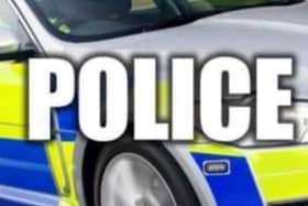 Three people have been injured, following a head-on collision in Worksop, involving a police car and a vehicle, believed to have been stolen.