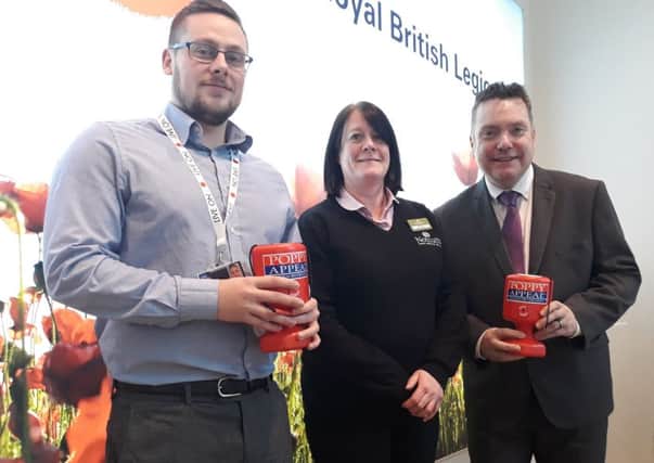Kath Mitchell, General Manager at Notcutts Ashton Park Garden Centre (centre), with Lloyd Orr, Greater Manchester & Lancashire Royal British Legion (left) and Alan Whitmore, Community Fundraising Manager (North), Royal British Legion (right)