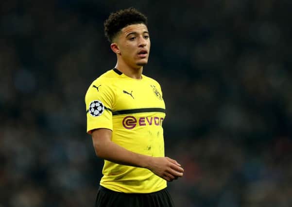LONDON, ENGLAND - FEBRUARY 13: Jadon Sancho of Borussia Dortmund looks on during the UEFA Champions League Round of 16 First Leg match between Tottenham Hotspur and Borussia Dortmund at Wembley Stadium on February 13, 2019 in London, England. (Photo by Clive Rose/Getty Images)