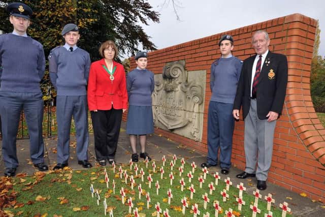 Field of Remembrance in Memorial Gardens, Worksop, pictured with members of Worksop Air Cadets are Coun Sybil Fielding and chairman of Worksop Royal British Legion, Brian Madden