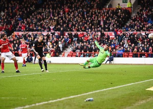Karim Ansarifard (37) of Nottingham Forest scores a goal to make it 2-0 during the Sky Bet Championship match between Nottingham Forest and Hull City at the City Ground, Nottingham on Saturday 9th March 2019. (Photo by Jon Hobley/MI News/NurPhoto via Getty Images)