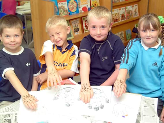 2003: This smiley bunch show off their artistic flare with their fabulous hand designs and drawings. Spot anyone you know?