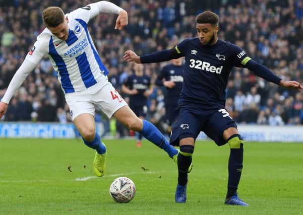 BRIGHTON, ENGLAND - FEBRUARY 16:  Viktor Gyokeres of Brighton and Hove Albion is challenged by Jayden Bogle of Derby County during the FA Cup Fifth Round match between Brighton and Hove Albion and Derby County at Amex Stadium on February 16, 2019 in Brighton, United Kingdom.  (Photo by Mike Hewitt/Getty Images)