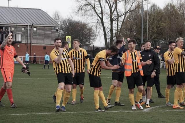 Worksop Town players celebrate another win.