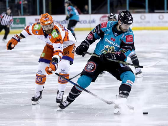 Belfast Giants' Jordan Smotherman with Sheffield Steelers' John Armstrong during Sundays Elite Ice Hockey League game at the SSE arena Belfast.  Photo by William Cherry/Presseye