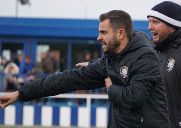 Worksop Town boss wants his players to stay grounded in the title race.