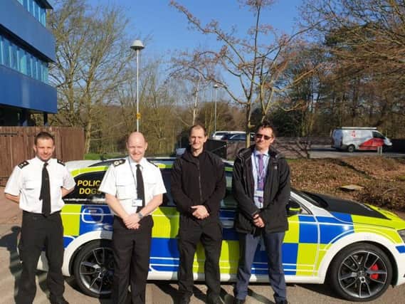 Officers at Nottinghamshire Police HQ with the new dog car.