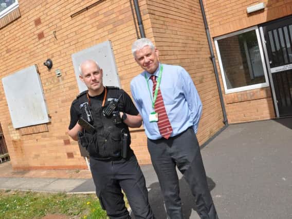 PC Nathan Thomas and Peter Exley, Tenancy and Estates Manager at Bassetlaw District Council.
