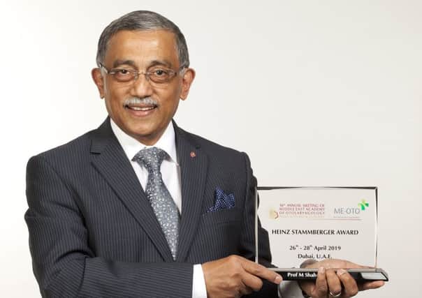 Surgeon Muhammad Shahed Quraishi with his award.