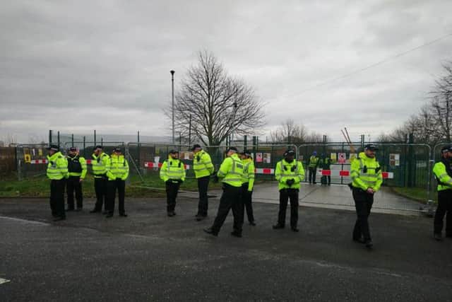 Police at a fracking site