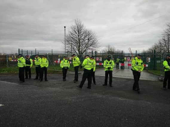 Police at a fracking site