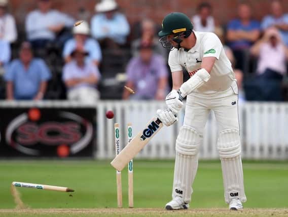 Notts' Jake Ball sees his wicket tumble thanks to Jamie Overton's delivery at Somerset.