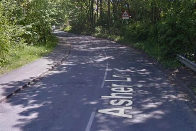 Traffic control (two-way signals) at Asher Lane, Hammersmith, Ripley, on entrance to Brook House, due to work being carried out by Western Power Distribution. Delays possible until August 23, 2019.
