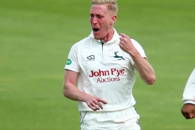 Luke Wood celebrates a wicket for Notts.