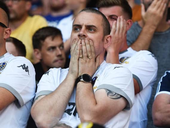 Leeds fans react to conceding a late equaliser against Derby.