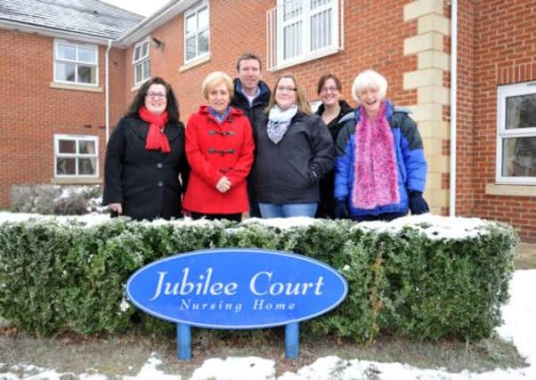 New owners of Jubilee Court Nursing Home, formerly Rufford Care Centre, Philip and Joy Gray pictured centre with staff members Jude Henderson, Kari Harper, Fiona Goldsmith and Karen Bowler (w130116-1a)