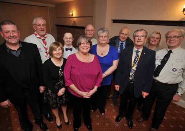 Worksop Rotary Club presentation evening to local groups who applied for help through the Rotay's community fund, pictured is President Graham Warburton with representatives from Bassetlaw Street Pastors, Community Garden Project, Manton Athletic Club, Stroke Club, 12th Worksop Scouts, Valley Social Club, Worksop Live At Home Scheme and Woodsetts Scouts (w121120-6)