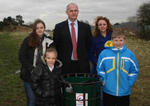 Coun Julie Leigh, Simon Tollervey, Coun Rebecca Leigh. Front - Millie Grievson (vice-chair of school council), Sam Goodall (chair of school council).