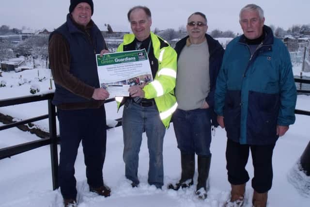 Martin Hadfield, chairman Claylands Avenue Gardeners Society 2010 -2012, Ian Greatorex from awards sponsors Siemens Metering Communications and Services, Dave Holliday secretary of Claylands Avenue Gardeners Society and Barry Harris, site steward and vice-chairman of Claylands Avenue Gardeners Society