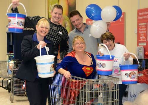 Jane Lee, Ken Bruton, Dan Sadler, Rachel marshall and Gillian Wallhead launch the Tesco Cancer Research charity of the year