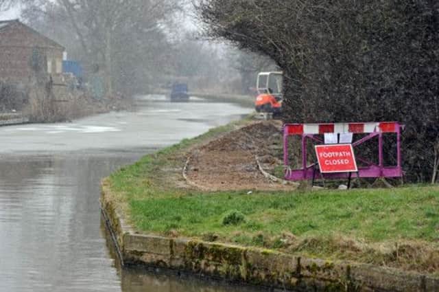 A project starts to improve the access on the Chesterfield Canal towpath between The Lock Keeper and the town centre. (w130213-3e)
