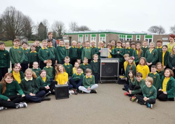 Children at Anston Greenlands Junior and Infant School have recorded a charity single in aid of War Child (w130304-3a)